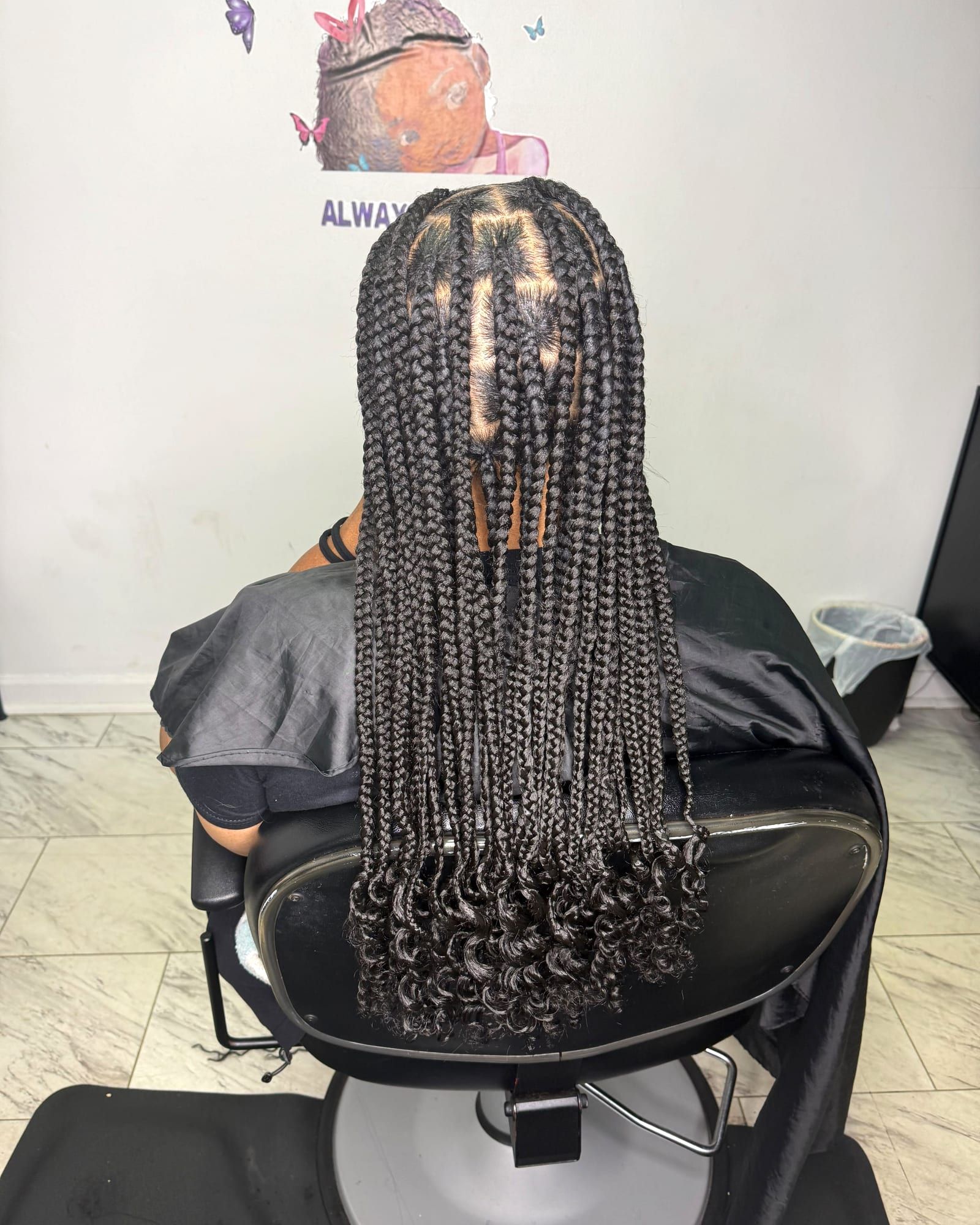 Long knotless braids with curly ends