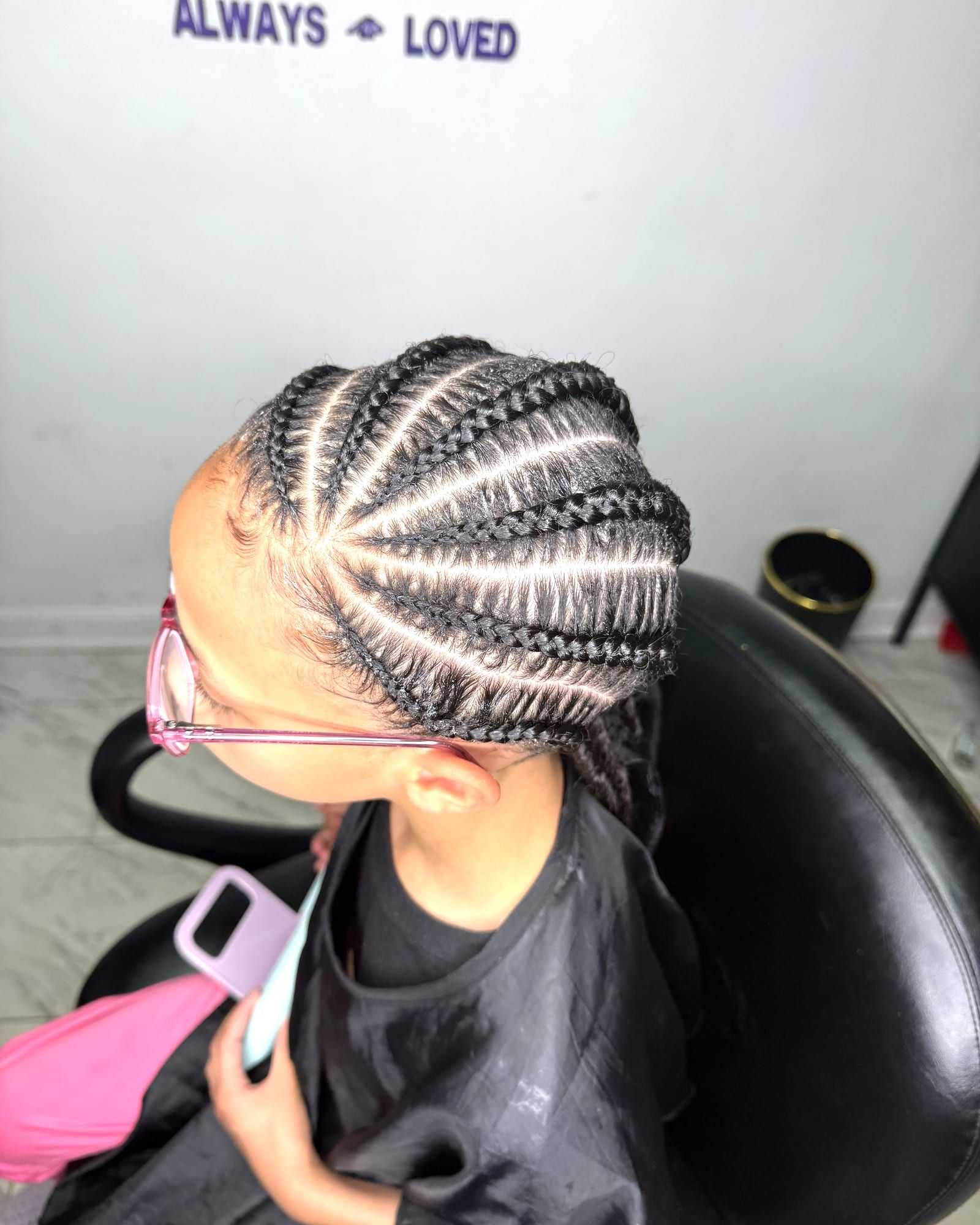 Kids curved cornrows