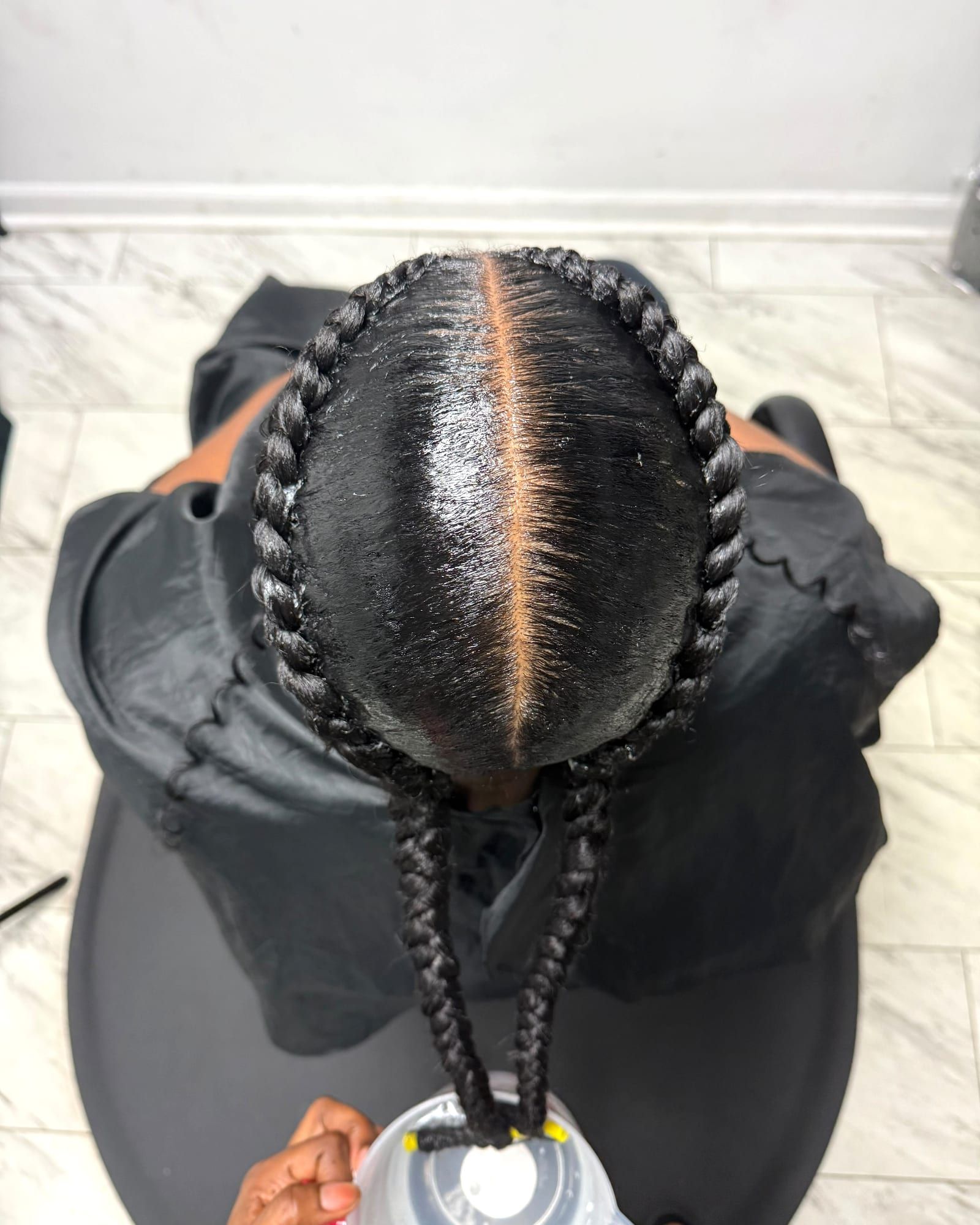 Two stitch braids with a clean middle part